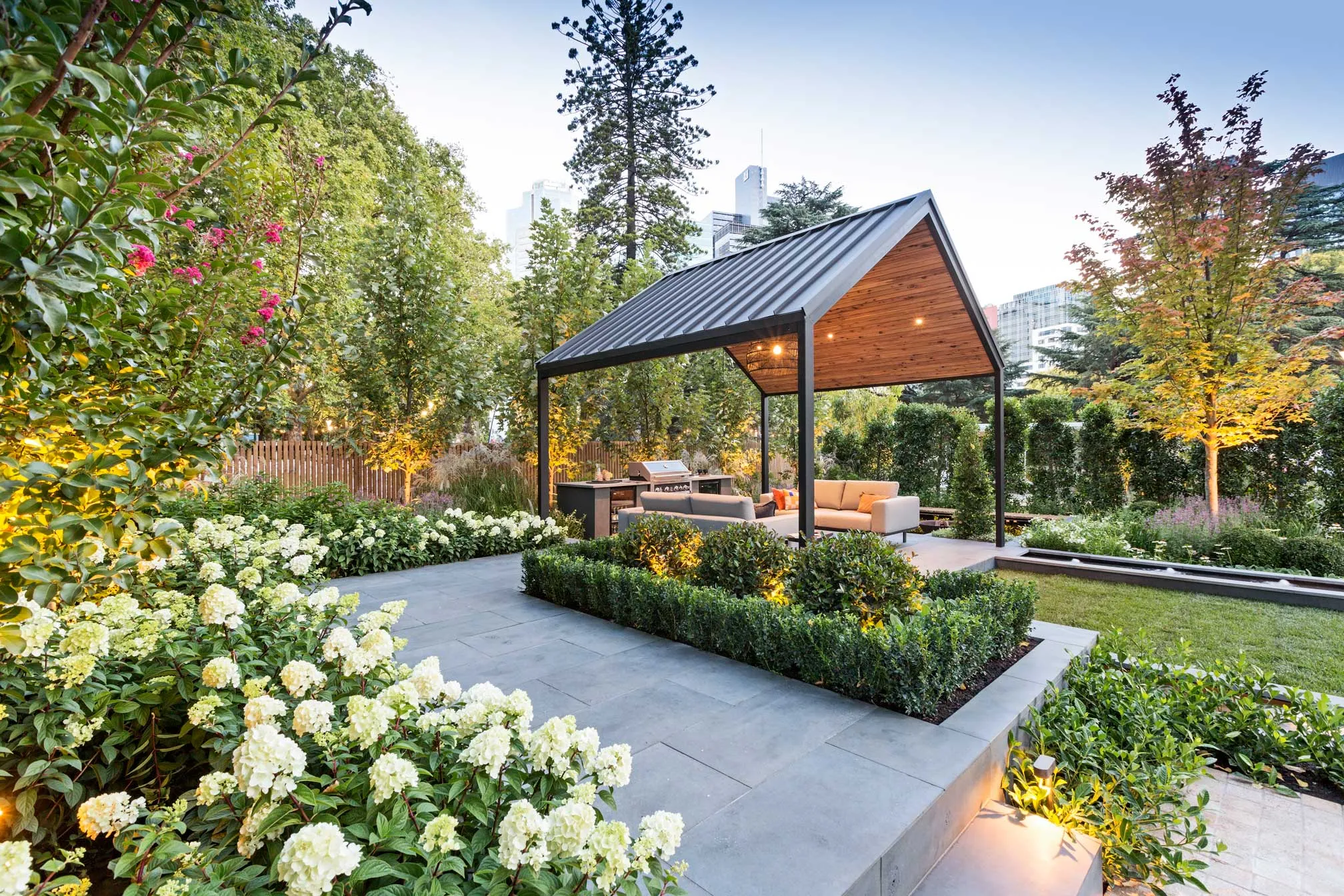 Luxury property surrounded by a vibrant landscaped garden